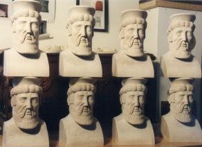 Eight Mahogany Persian Busts